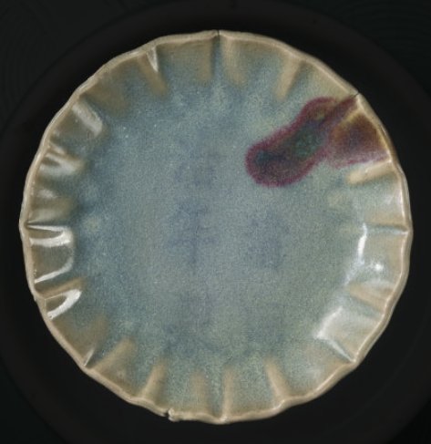Jun Ware Fluted Plate with Copper-Red Splash - ceramics collectible