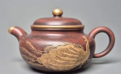 Yixing Zisha Teapot with Carved Peacock Motif - ceramics collectible
