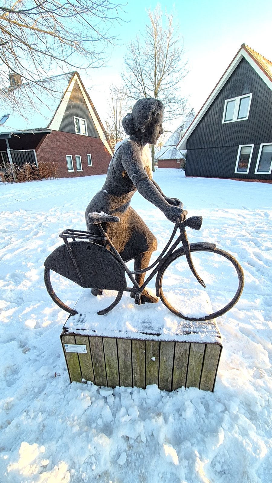 Figurative Sculpture of Woman on Bicycle - view 3