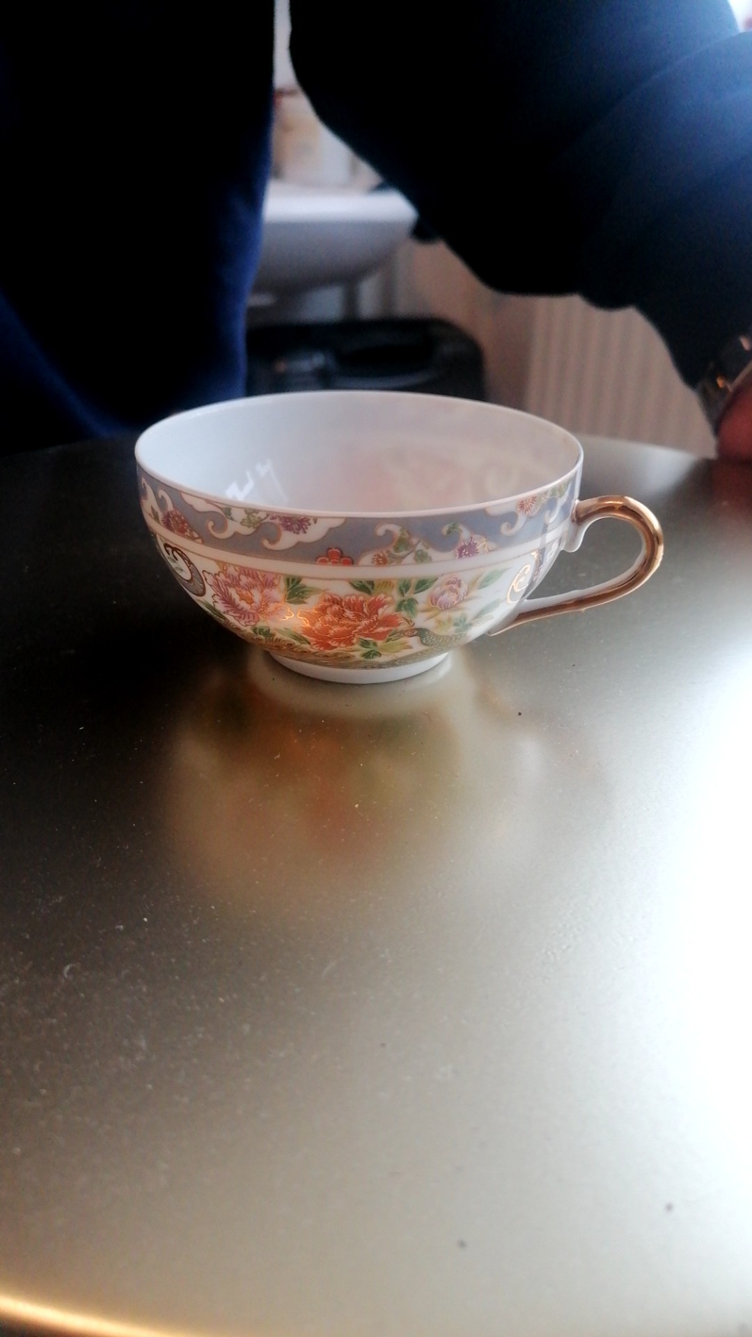 Porcelain Teacup with Floral Decoration and Gilt Handle - view 2