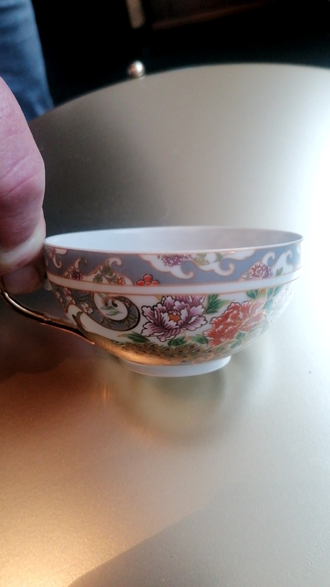 Porcelain Teacup with Floral Decoration and Gilt Handle - view 3