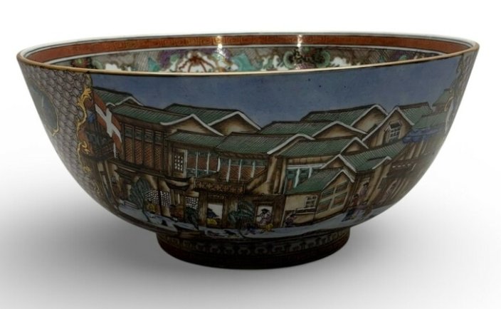 Chinese export style porcelain punch bowl featuring an enamel depiction of the Canton trading factories (Hongs) and internal merchant scene. - view 1