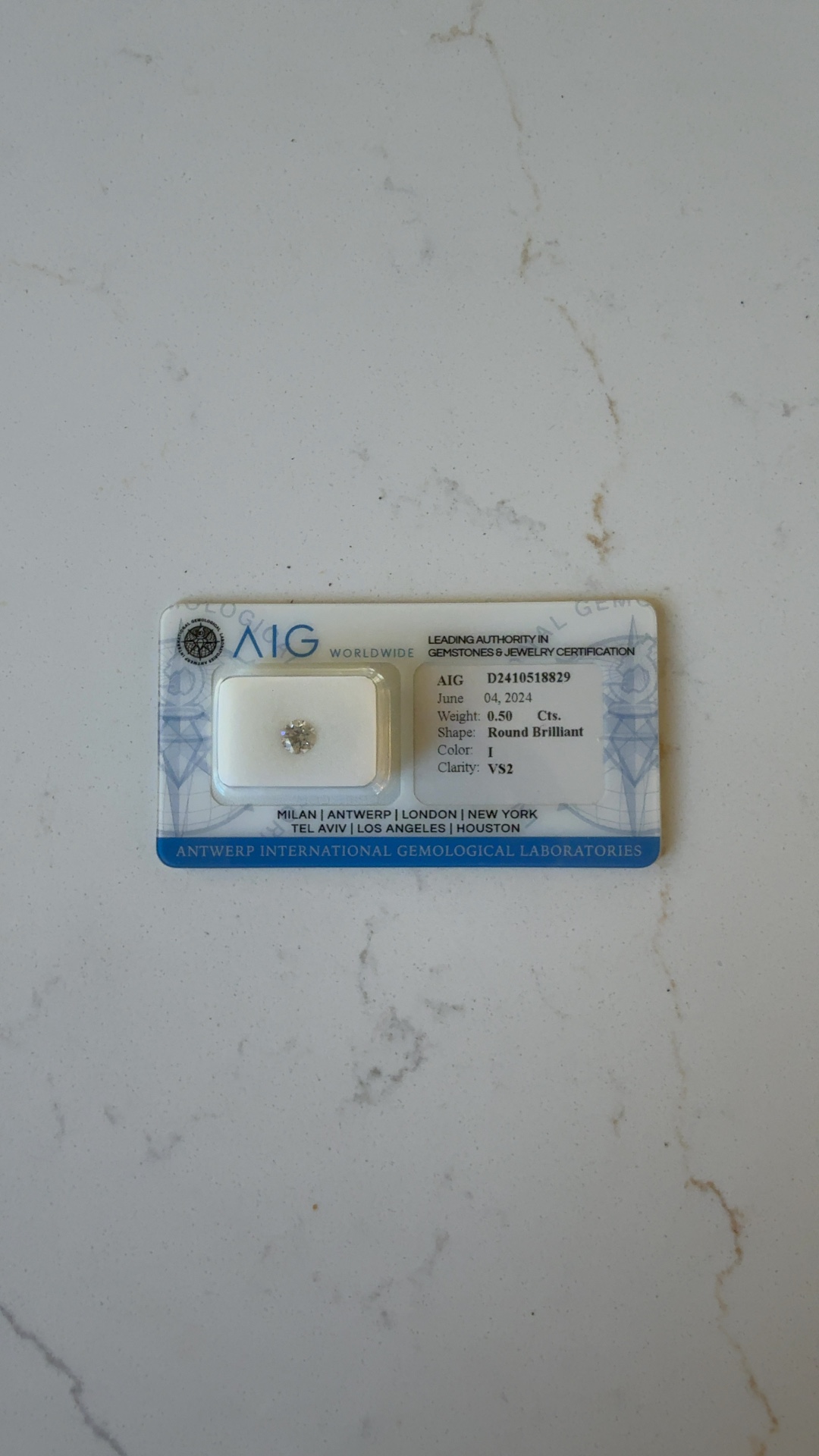 0.50 Carat Round Brilliant Diamond with AIG Certification - view 1