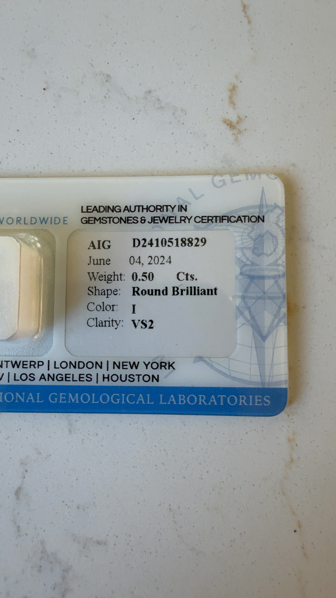 0.50 Carat Round Brilliant Diamond with AIG Certification - view 2