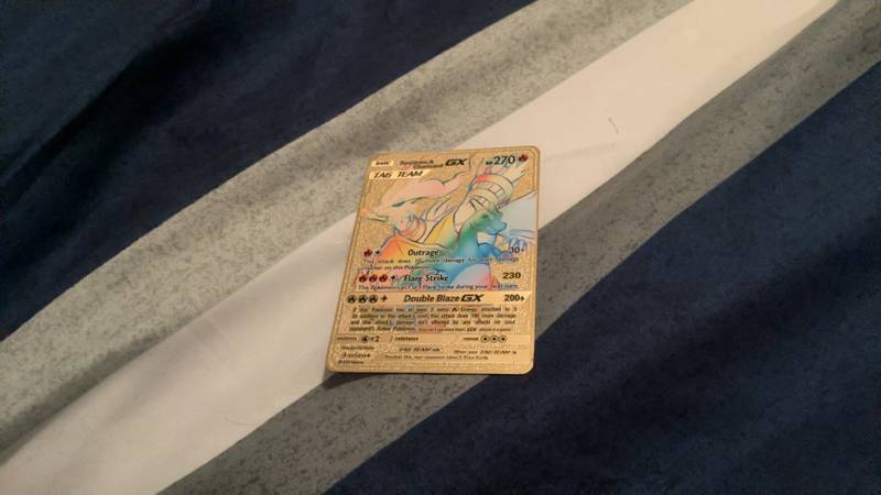 Gold foil Reshiram & Charizard GX TAG TEAM Pokémon card, set code m2a-240. - view 1