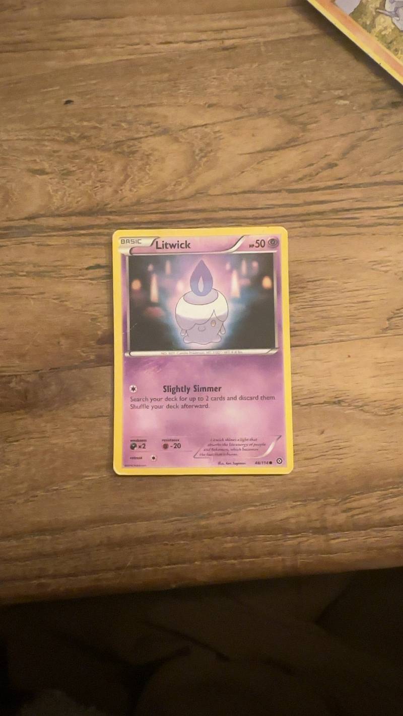 Pokemon TCG Litwick card from the Black & White: Boundaries Crossed set, 48/149, illustrated by Ken Sugimori.