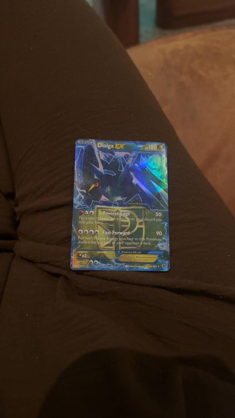 Full art Pokémon TCG Dialga EX from the Plasma Blast set, card number 65/101, showing holofoil pattern.