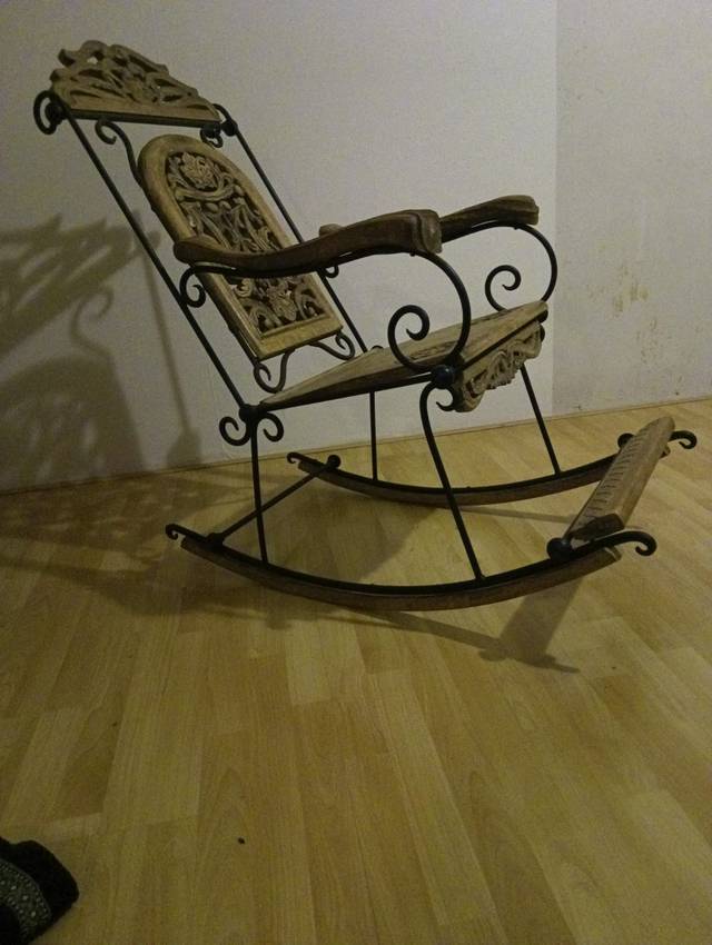 Wrought Iron and Carved Wood Rocking Chair - interior collectible