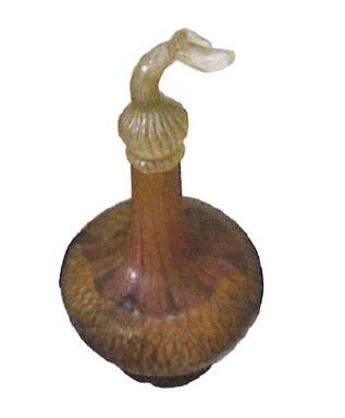 Art Nouveau amber and brown cameo glass flacon in an onion bulb shape with a curved organic glass stopper, signed Gallé.