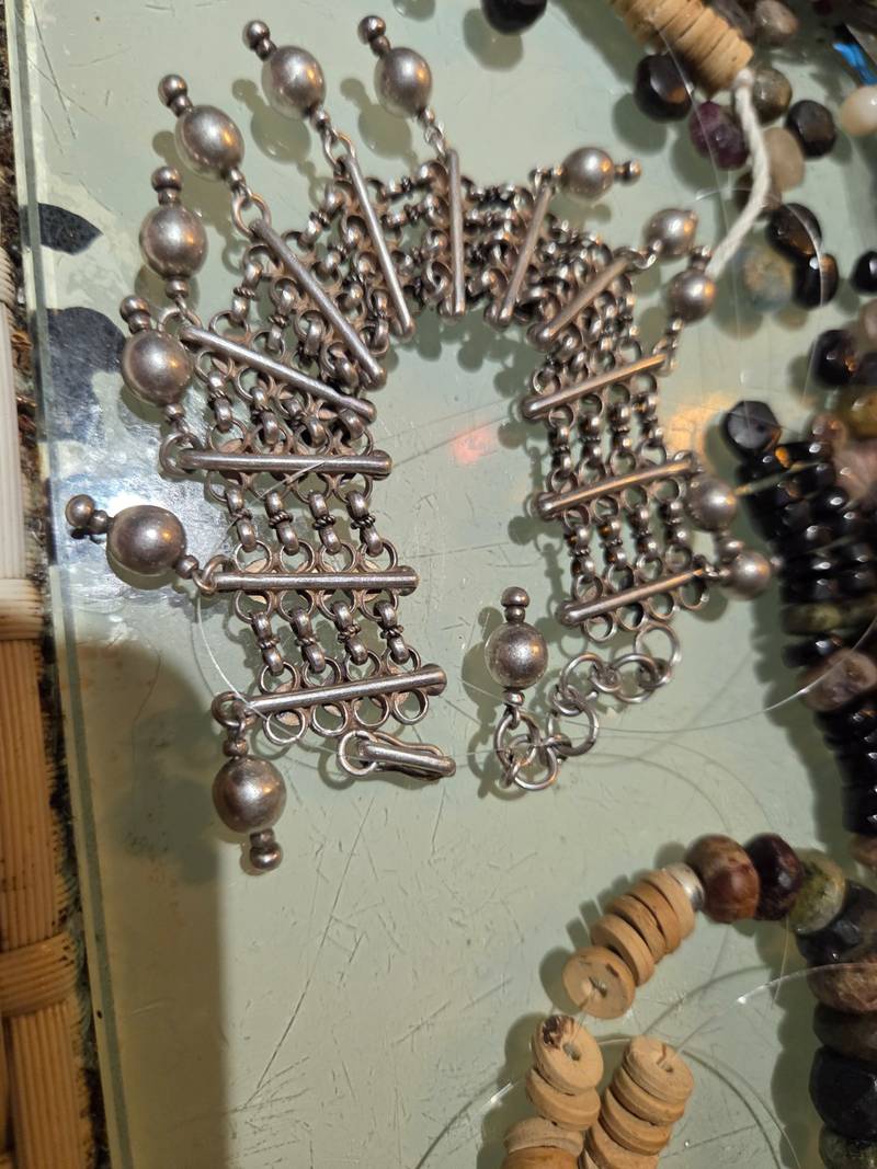 Handcrafted Indian silver bracelet with multiple strands, horizontal bars, and ball-shaped dangles with a 925 hallmark. - view 1