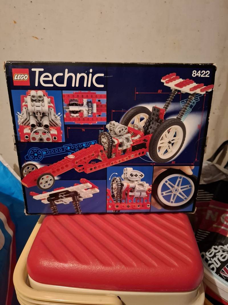 The retail box for LEGO Technic set 8422 showing a red motorcycle on the front and a dragster on the back. - view 1