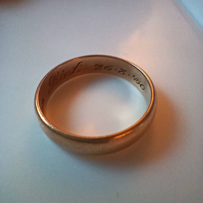 Close-up of a vintage 14K gold wedding band with the inscription 'Riet 26.8.'60' and '14K' hallmark visible on the inside. - view 1