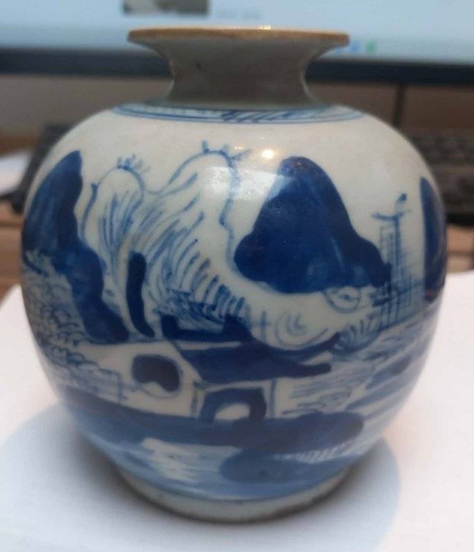 Chinese blue and white porcelain mini ginger jar featuring a landscape with mountains and a pavilion, unglazed base visible. - view 1