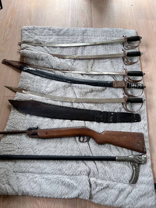 Collection of Edged Weapons, Air Rifle, and Novelty Walking Stick - militaria collectible