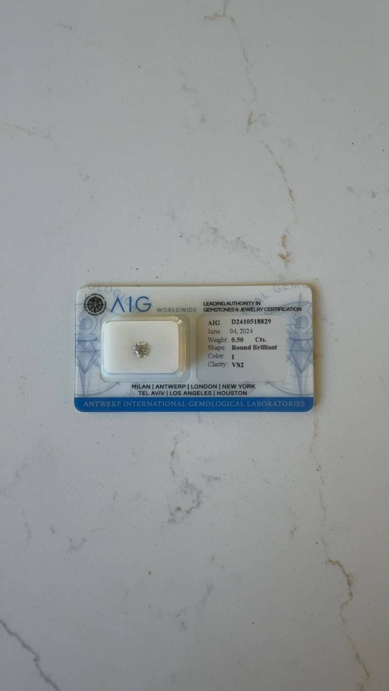 0.50 Carat Round Brilliant Diamond (AIG D2410518829) - gemstones collectible