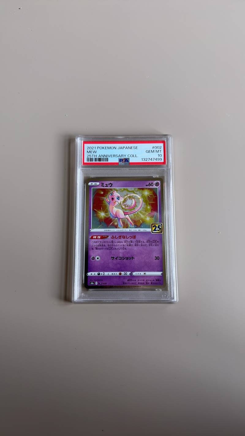 PSA 10 Gem Mint Japanese Pokemon Card Mew 002/028 from 25th Anniversary Collection s8a, featuring Yuu Nishida artwork and gold 25th foil stamp - view 1