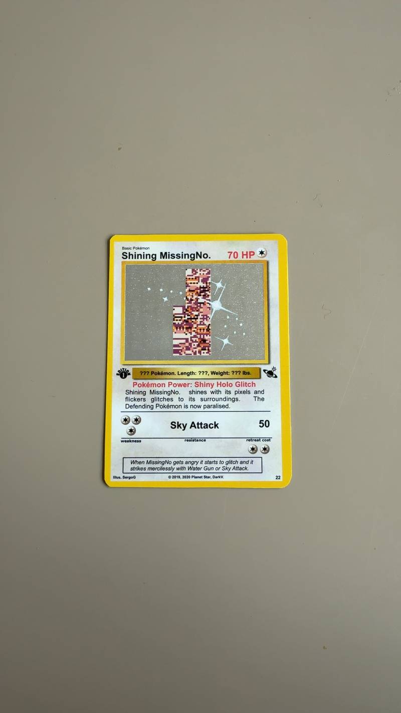 A custom Pokémon card named 'Shining MissingNo.' featuring glitch pixel art on a silver starry background with a 1st edition symbol. - view 1