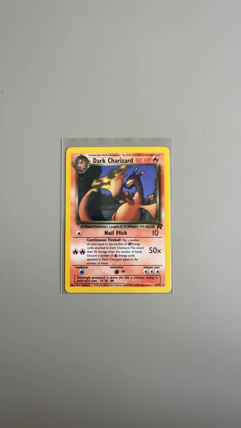 Dark Charizard vintage Pokémon card from Team Rocket set, non-holographic rare 21/82. - view 1