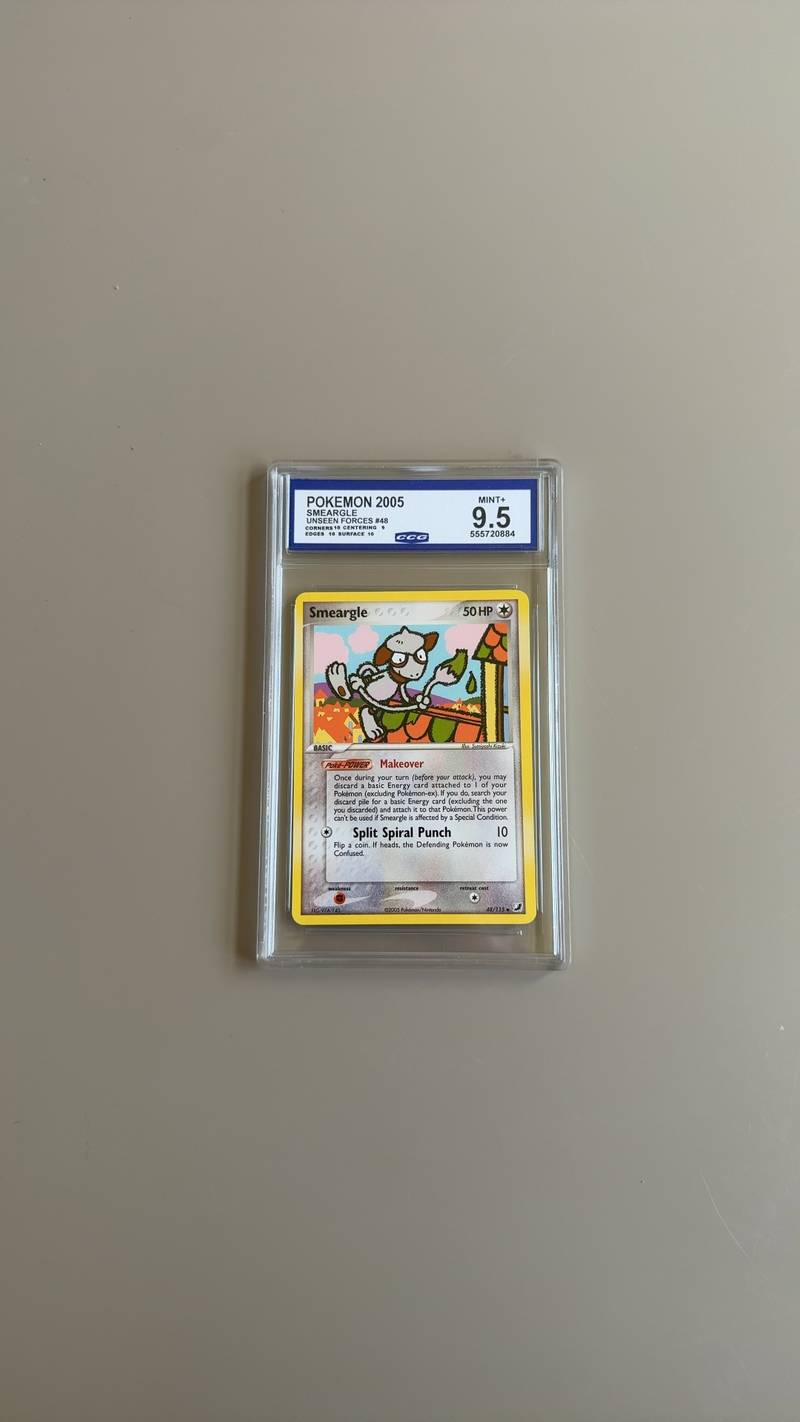 Slabbed Smeargle Pokémon card from EX Unseen Forces set, graded 9.5 by CCG with sub-grades visible on the blue and white label. - view 1